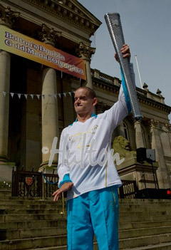 Tony with the paralympic torch
